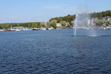 Lake Saimaa in Lappeenranta harbor. A fountain in water.