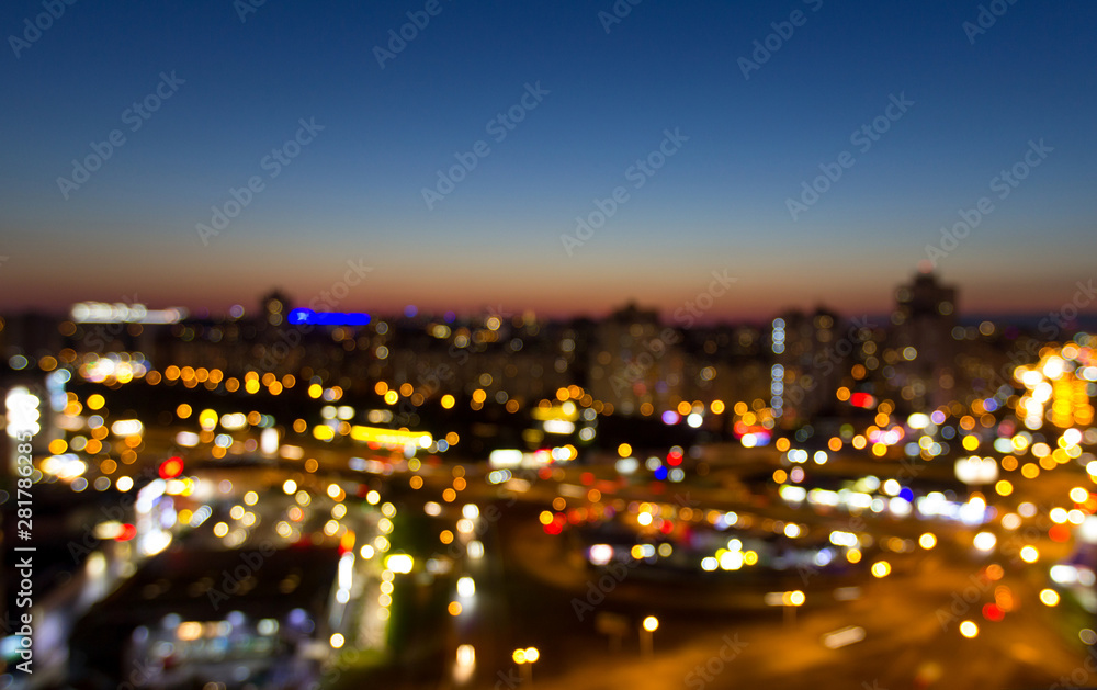 Night cityscape bokeh, abstract blur defocused background at evening time