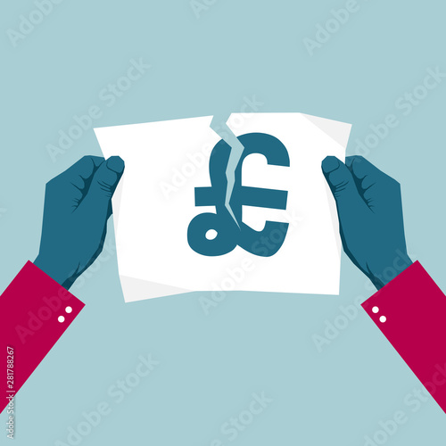 Tears the pound symbol with both hands. Isolated on blue background.	