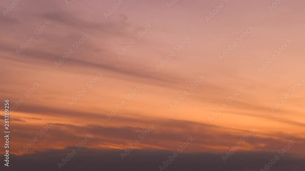 Timelapse of clouds moving in sky at sunset Timelapse of clouds moving in sky at sunset