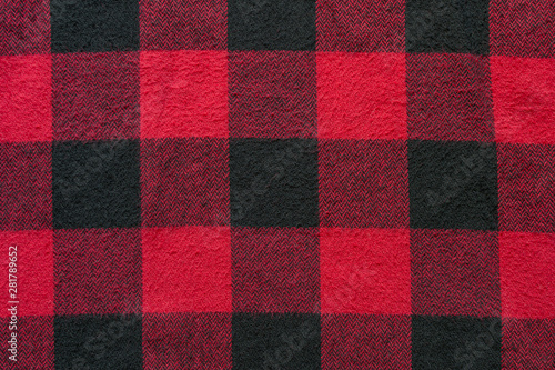 Black and Red Fabric in a Cage. Plaid material. Clothes background