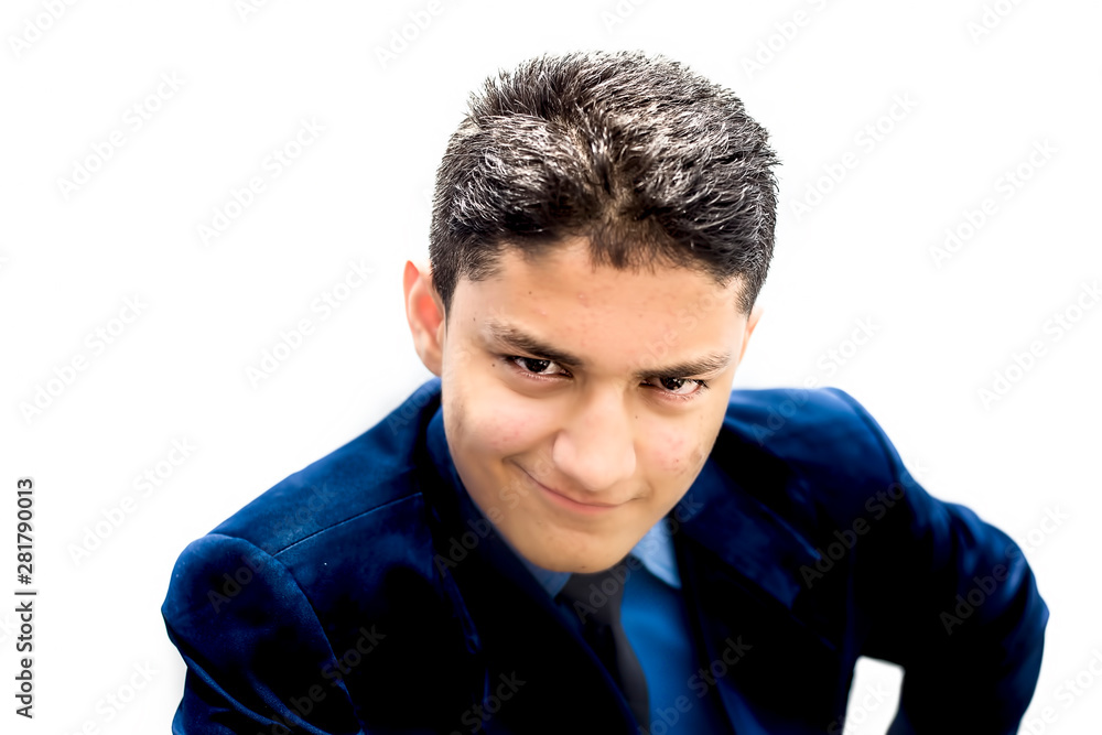 Portrait shot of a businessman wearing a blue colored suit with energetic smile and energy full expressions isolated on white.Looking straight in the camera. Portrait shot of a businessman wearing a blue colored suit with energetic smile and energy full expressions isolated on white.Looking straight in the camera.