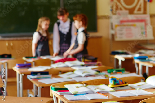 Primary school students talk during the break in class