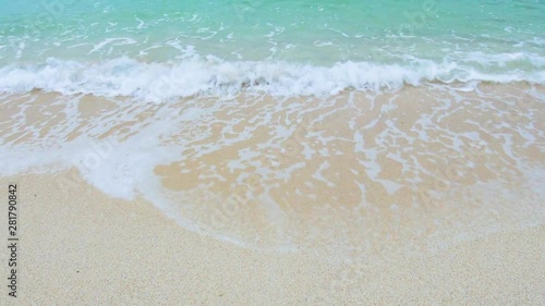 Sandy beach and waves in sea, Japan photo