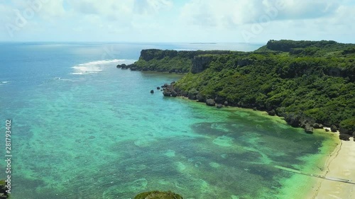 Beach and cliffs on seashore, Kafu Banta, Miyagi Island, Japan photo