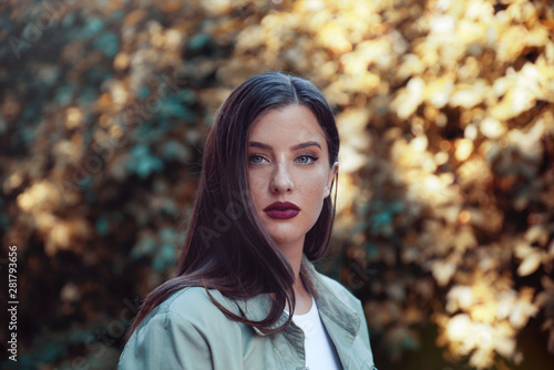 Beautiful woman in jacket portrait outdoors