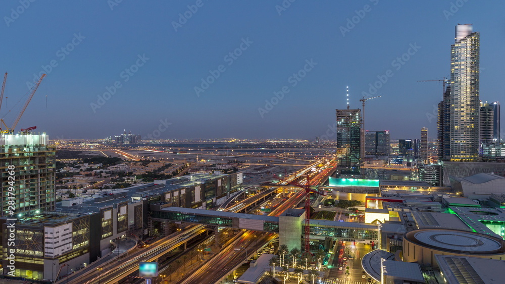 Aerial view of Financial center road day to night timelapse with under construction building