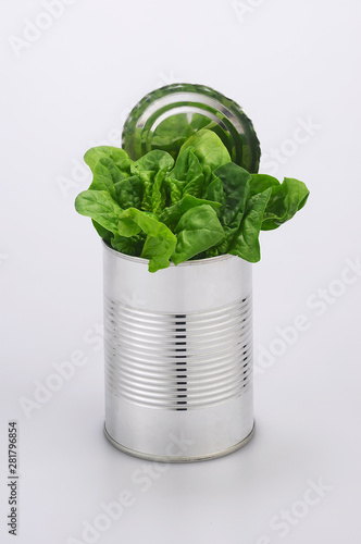 tin of fresh spinach isolated in white background