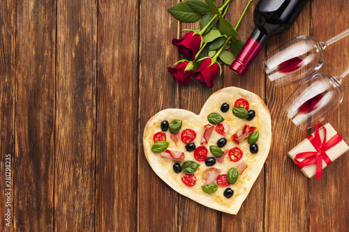 Top view romantic table setting with pizza