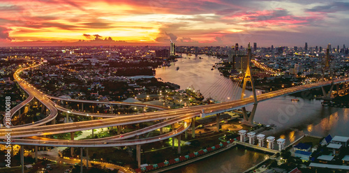 aerial view of bhumibol bridge at dusk in bangkok thailand photo
