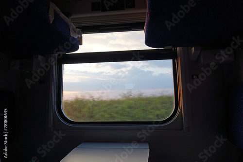 beautiful sunset view from the window of a train car