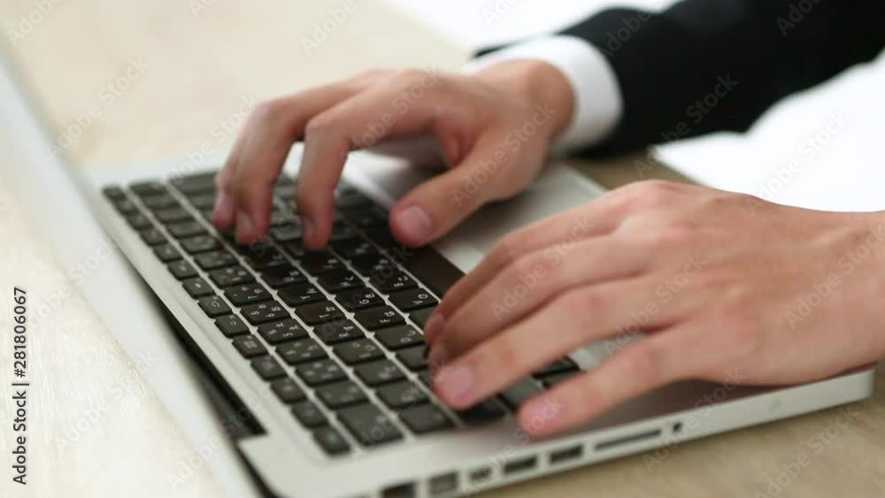 Close up of hands of businessman using laptop Close up of hands of businessman using laptop