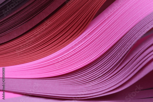 Abstract color wave curl red and pink strip paper background for prints, posters, cards.