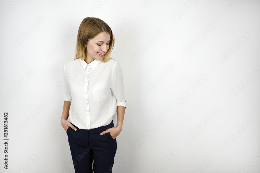 young beautiful smiling blonde business woman after successful interview isolated white background young beautiful smiling blonde business woman after successful interview isolated white background