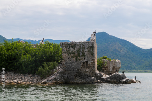 ancient ruins of the Turkish fortress prison on Grmozur island in Lake Skadar in Montenegro. photo