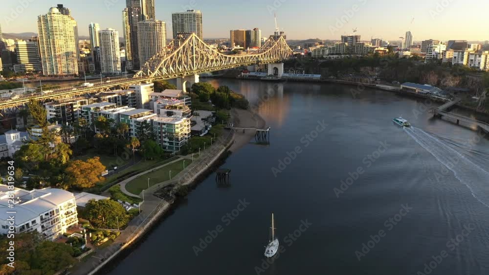 Brisbane city sunrise beautiful aerial with CBD, Brisbane river, buildings, Story Bridge and Howard Smith Wharf Precinct. Brisbane city sunrise beautiful aerial with CBD, Brisbane river, buildings, Story Bridge and Howard Smith Wharf Precinct.