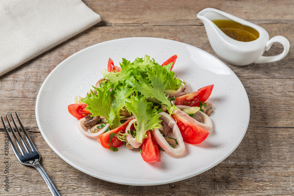 Salad of squid, mushrooms, and vegetables. 