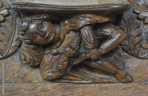 A misericord in Wells Cathedral Somerset England photo