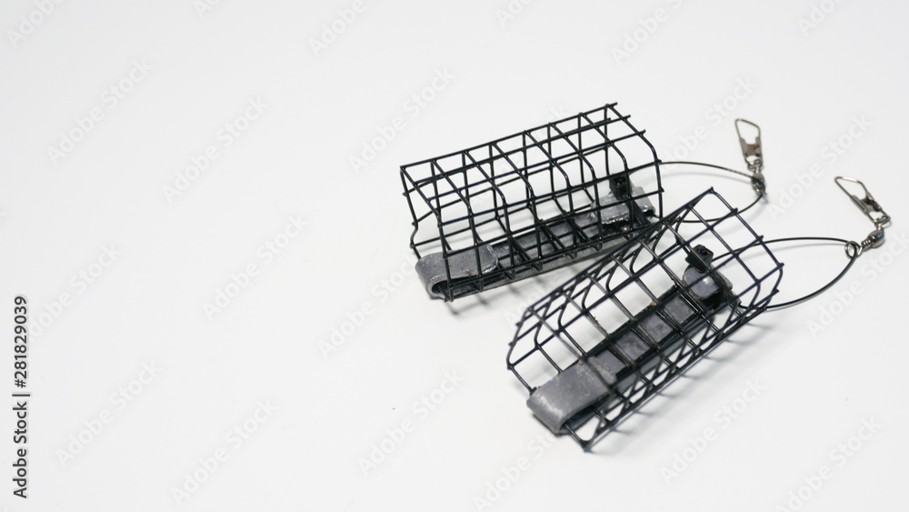 Two cage feeders for feeder fishing with copy space on left Two cage feeders for feeder fishing with copy space on left