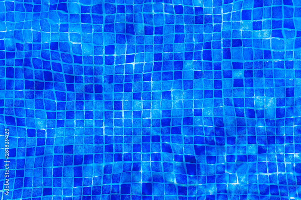 blue abstract background. Clear blue water in a Swimming Pool. With interesting through the sunlight and the movement of the water. blue abstract background. Clear blue water in a Swimming Pool. With interesting through the sunlight and the movement of the water.