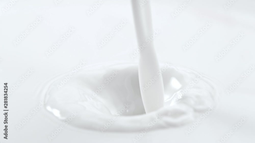 Pouring fresh milk in super slow motion. Shooted with high speed cinema camera at 1000fps, 4K. Pouring fresh milk in super slow motion. Shooted with high speed cinema camera at 1000fps, 4K.
