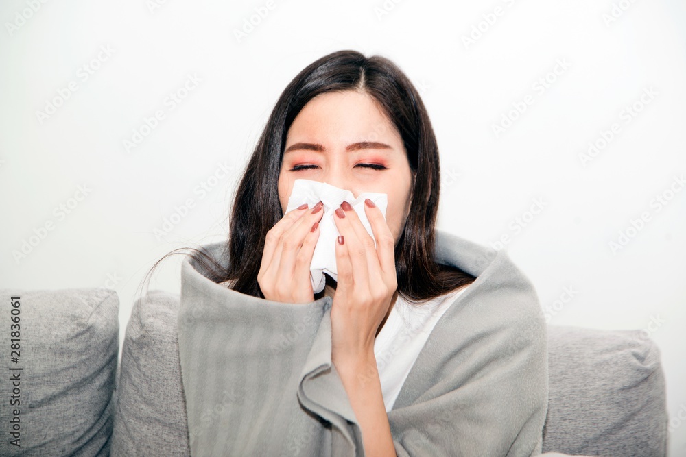 Asian women with stress that suffer from allergies and close the nose with tissue paper. Because of having sneezing all the time .. Asian women with stress that suffer from allergies and close the nose with tissue paper. Because of having sneezing all the time ..