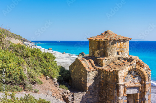 Agios Pavlos beach with Saint Paul church, a very old Byzantine church that was built at the place Selouda, an incredible beach at Opiso Egiali area, Chania, Crete, Greece. photo