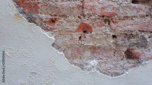 Cracked brick wall for background