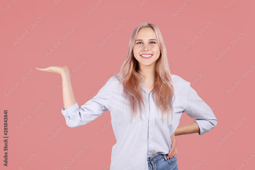 Young beautiful blonde woman with pink hair toner posing over bright colorful isolated background. Portrait of teenage female model showing emotions. Close up, copy space. Young beautiful blonde woman with pink hair toner posing over bright colorful isolated background. Portrait of teenage female model showing emotions. Close up, copy space.