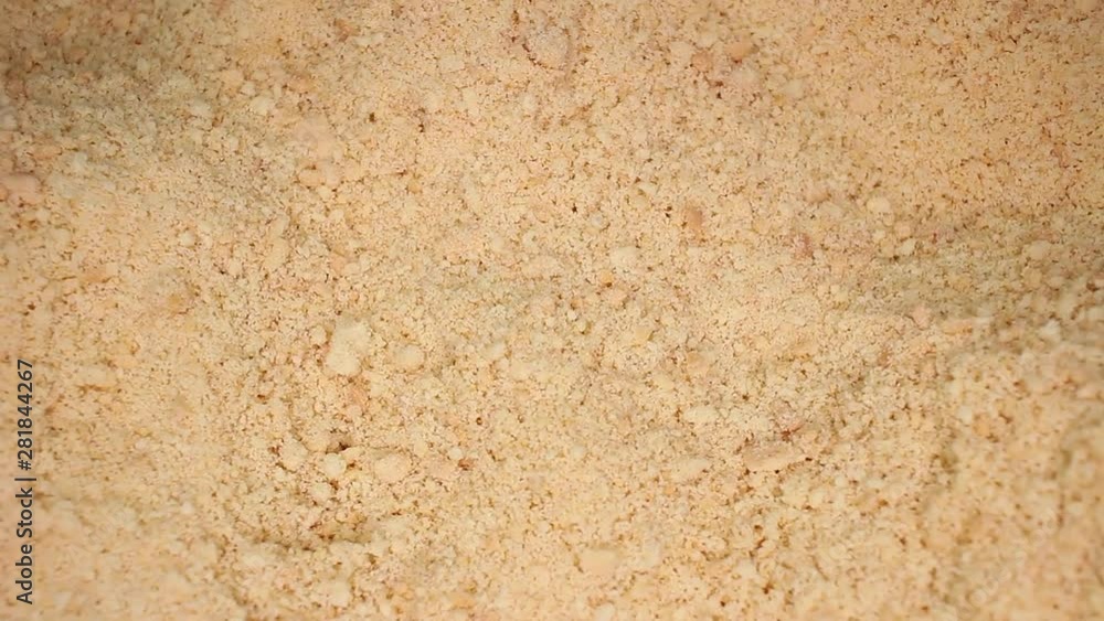 Crushed biscuits Biscuit Closeup Texture on Rotating Plate Crushed biscuits Biscuit Closeup Texture on Rotating Plate