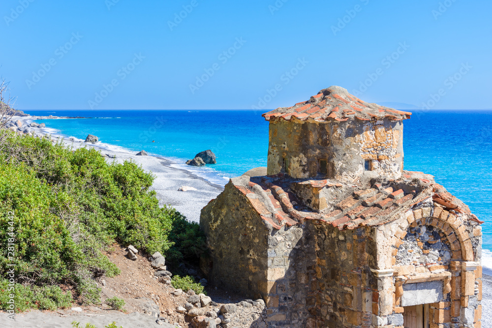 Agios Pavlos beach with Saint Paul church, a very old Byzantine church that was built at the place Selouda, an incredible beach at Opiso Egiali area, Chania, Crete, Greece.