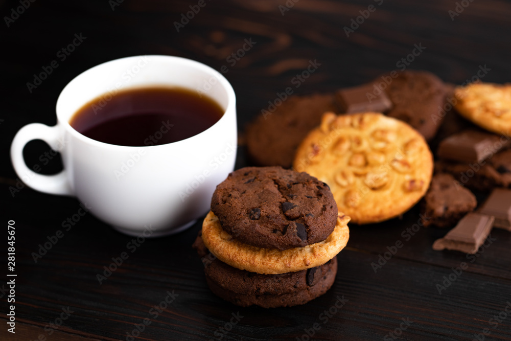 Chocolate cookies on wooden table.Homemade food on wooden background Chocolate cookies on wooden table.Homemade food on wooden background