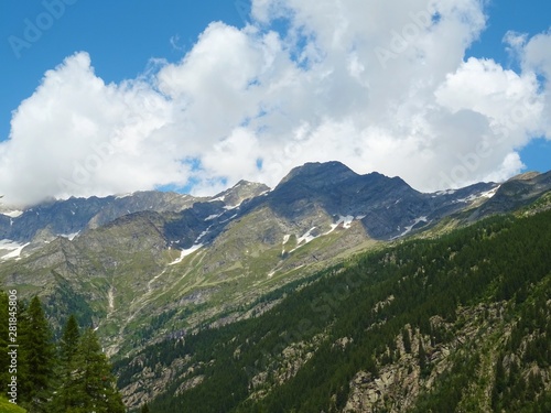 The Alps with its woods and glaciers near Monte Rosa and the town of Macugnaga  Italy - July 2019.