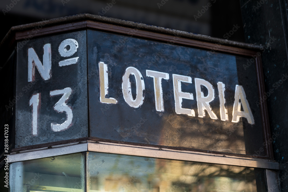 Fototapeta premium Lottery poster in Spanish language. Ancient and traditional aspect.Lottery poster in Spanish language. With the number 13 for the supersitiosos. Ancient and traditional aspect.