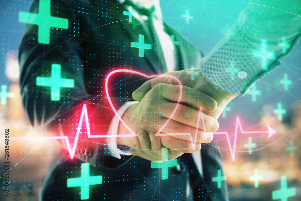 Double exposure of heart drawing on city view background with handshake. Concept of medical education Double exposure of heart drawing on city view background with handshake. Concept of medical education