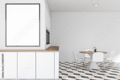 White kitchen interior with table and poster