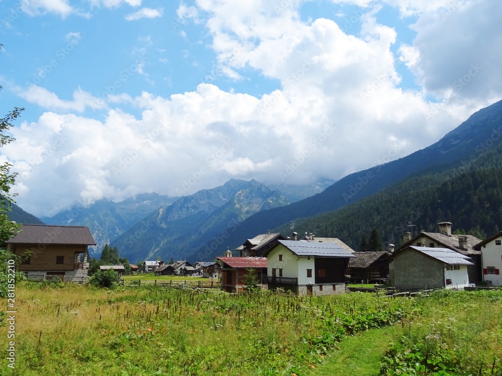 The architecture of the small town of Macugnaga and its hamlets, in the Italian Alps - July 2019. The architecture of the small town of Macugnaga and its hamlets, in the Italian Alps - July 2019.