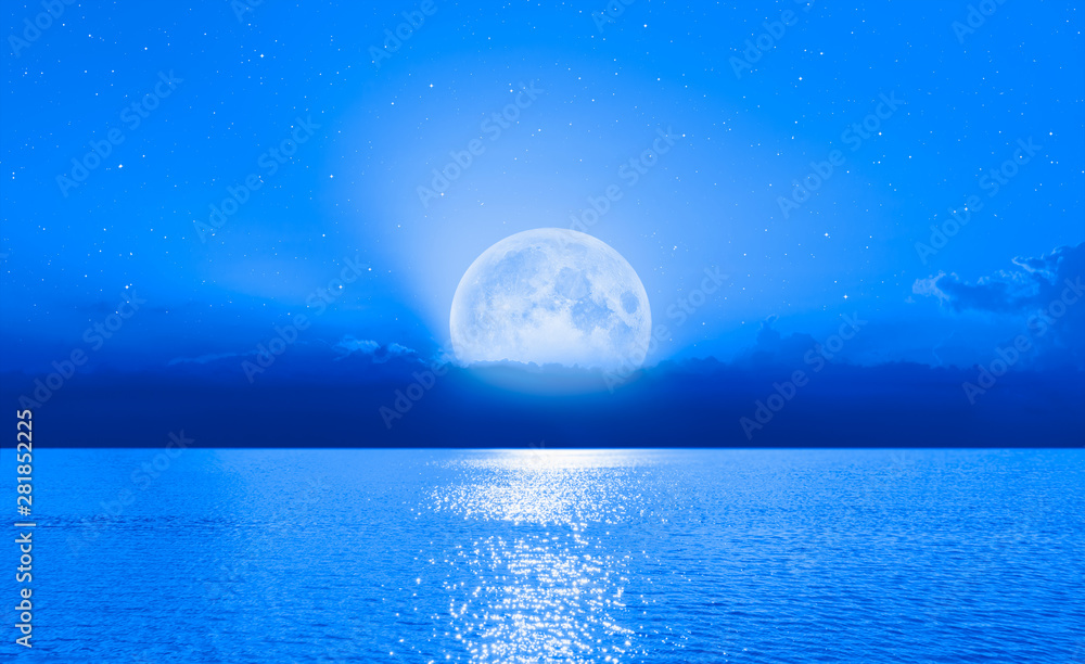 Moon over the sea with lot of stars and nebula at night 