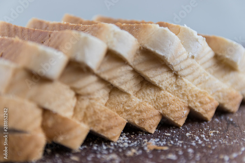 Stacked bread on wooden table