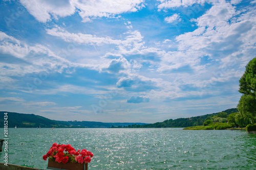 A beautiful summer day with sun, clouds, wind on Lake Constance.