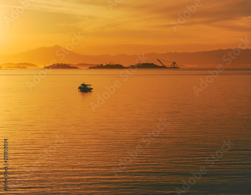 Beautiful aerial image of fishing boats on sunset. © Rafa