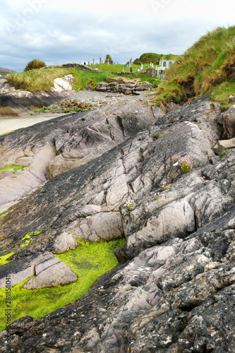 Abbey Island, the patch of land in Derrynane Historic Park, famous for ruins of Derrynane Abbey and cementery, located in County Kerry, Ireland photo