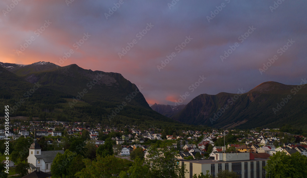 Night sky in Orsta Norway. Panoramic aerial view from drone at sunset in july 2019