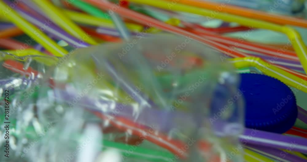 Plastic Floating In The Water Causing Environmental Damage To Beautiful Oceans With Straws And Bottles Plastic Floating In The Water Causing Environmental Damage To Beautiful Oceans With Straws And Bottles