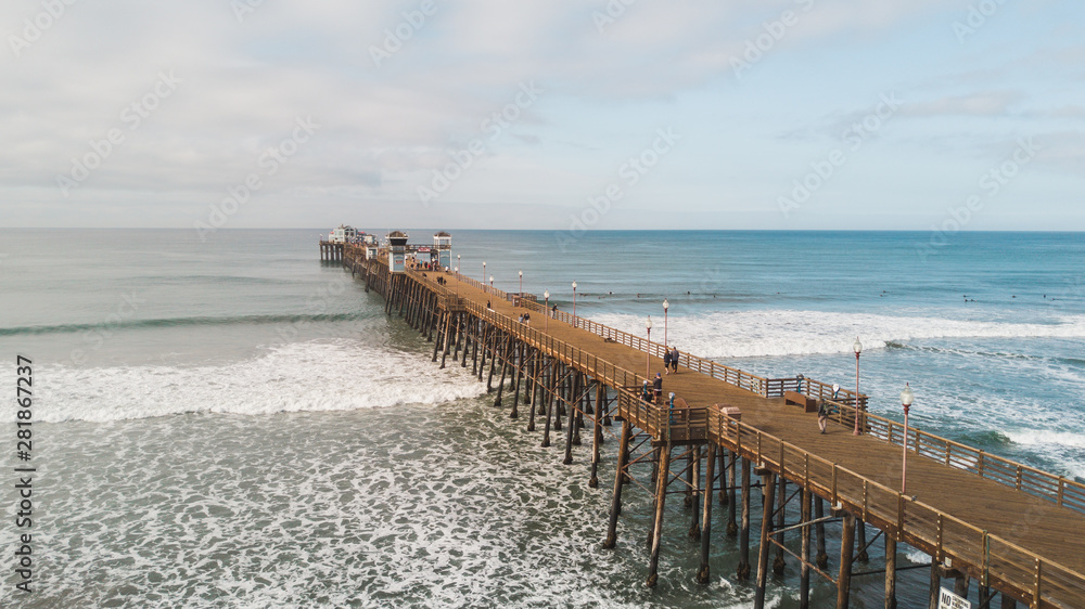OCEANSIDE, California (USA): Drone shot of the longest wooden maiden pier of the USA West Coast, Oceanside Pier. 