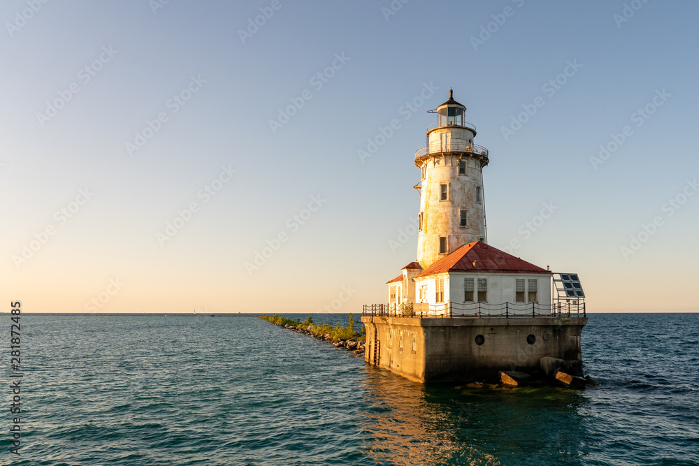 Chicago Harbor Lighthouse and breakwall at sunset