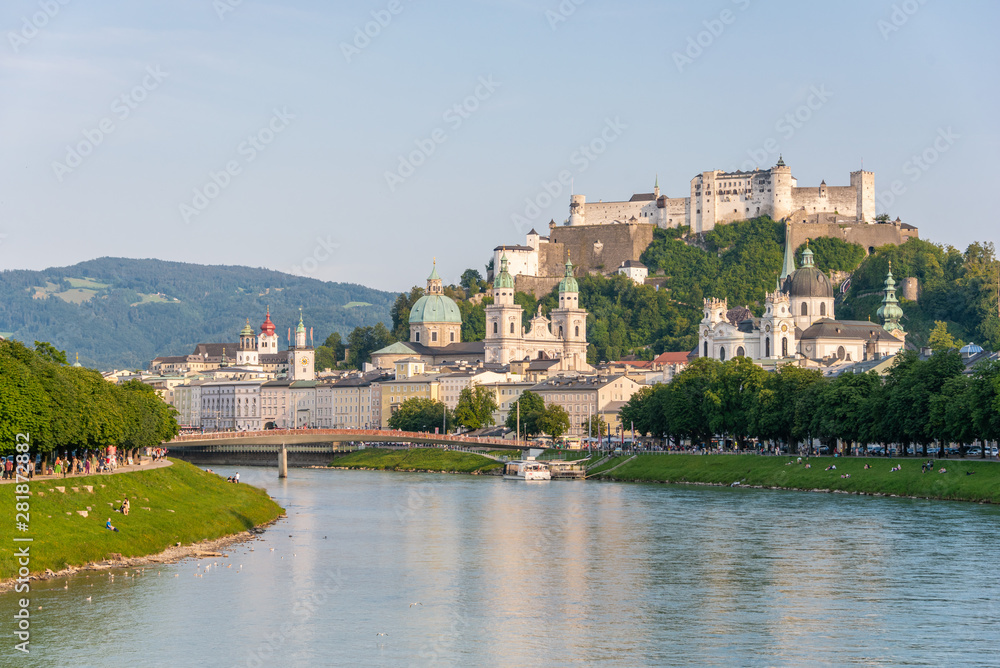 Salzburg skyline with Hohensalzburg Fortress and Salzach river in summer, Austria.