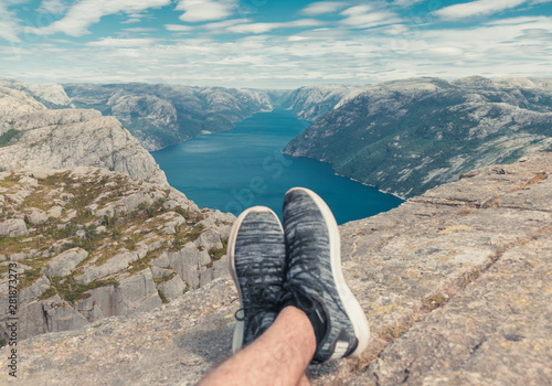 feet on top of the mountain