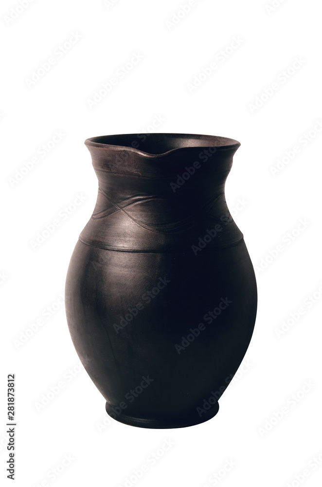 Old brown clay pitcher for drinks isolated on a white background.