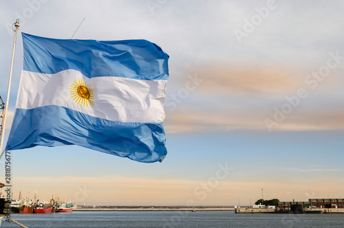 Argentine flag flying in the port of Mar del Plata. ARA San Juan submarine in the background.